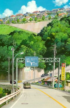 an image of a street scene with cars driving down the road and green hills in the background