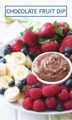 chocolate fruit dip surrounded by berries and bananas on a white plate with the words chocolate fruit dip