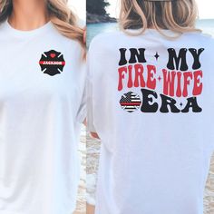 Personalized Fire Wife Comfort Colors Tshirt is the perfect gift for any fire wife for her birthday, Christmas, or Anniversary! In the personalization box, enter the name or number of your firefighter for the front pocket. (Ex: 3602 or Jackson) This shirt runs true to size.  If you want an oversized look, please order one size up.  If you want the oversized dress look, please size up two sizes. Short Sleeve: This is made with a 1717 Comfort Colors, garment-dyed t-shirt. Made with 100% ring-spun Firefighter Wife Shirt, Wife Shirts, Fire Wife, Firefighter Wife, Comfort Colors Tshirt, Oversized Dress, Wife Gift, Dye T Shirt, Personalized Custom