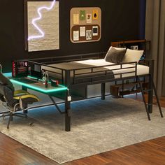 a computer desk sitting on top of a wooden floor