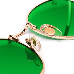 Gender: Unisex Frame: Gold Metal Wireframe UV Rating: UV400 Fit / Size: Small In the Box: Sunglasses & Microfiber Pouch Lens Width: 50mm Lens Height: 45mm Bridge Width: 15mm Arm Length: 125mm Box Sunglasses, Color Sunglasses, Chakra Colors, Sunglasses Round, Green Sunglasses, Green Lenses, Round Frames, Wireframe, Round Frame