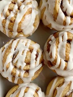 glazed donuts with white icing in a box