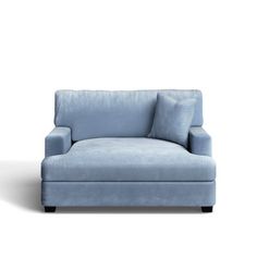 a light blue couch with pillows on the back and armrests, against a white background