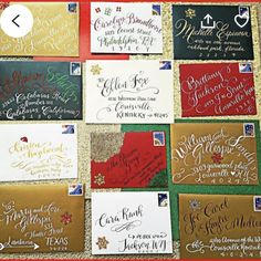 many different types of calligraphy are displayed on a tablecloth with red and gold trimmings