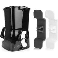 a black and white coffee maker next to a cup holder