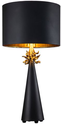 a table lamp with a black shade and gold details on the bottom half of it