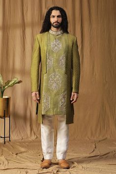 Green asymmetric sherwani with moti, dabka and zardosi embroidered panels. Paired with an off white pant. - Aza Fashions Embroidered Sherwani, Off White Pants, White Pant, Satin Color, Band Collar, Green Silk, Pant Set, Embroidered Silk, White Pants