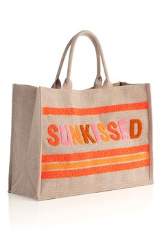 Carry all of your summer essentials for a weekend away in Shiraleah's "Sunkissed" Beach Bag. Made of durable jute fabric and roomy enough to fit a towel and then some, look no further for your favorite warm weather bag. The trendy toothbrush embroidery adds a pop of color and intention to this versatile tote. Pair with other items from Shiraleah to complete your look! Features double handles, a magnetic snap closure, and 1 inner zip pocket Shiraleah is a trend-driven lifestyle brand focused on t Summer Travel Woven Canvas Bag, Woven Canvas Travel Bag For Summer, Summer Woven Canvas Beach Bag, Trendy Summer Beach Bag For Weekends, Summer Canvas Bag In Natural Color For Beach Season, Summer Weekend Cotton Bag, Summer Weekend Cotton Bags, Natural Summer Canvas Bag For Beach Season, Summer Natural Canvas Bag For Beach Season