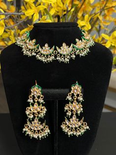 Pakistani  kundan set with earrings  earrings length- 2.5  inches Style tip- ----------- Pair it with any beautiful traditional outfits  and flaunt with Unique style of collection from us. Perfect match for Festival and Traditional wear.  Take Care Tips-  ---------------- Kee away from perfume, Hair spray and. Moisture.  Store in dry place , Ziplock bag or Airtight box.    Clean with dry cloth.  Jewellery is the last thing you should wear and first thing you should remove.  --------------------- Heavy Kundan Jewelry Sets For Eid, Bollywood Kundan Chandbali Jewelry Sets, Kundan Chandbali Jewelry Sets For Eid, Bollywood Kundan Jewelry Sets For Diwali, Bollywood Kundan Jewelry Sets With Gota Work, Bollywood Style Kundan Jewelry Sets, Bollywood Kundan Jewelry Sets With Mirror Work, Bollywood Jewelry Sets With Kundan And Mirror Work, Bollywood Jewelry Sets With Mirror Work For Festivals