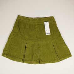 Elevate Your Style With This Urban Outfitters Bdg Corduroy Skirt. The Pleated Design And Y2k Vibe Add A Chic Touch, While The Green Color Brings A Pop Of Freshness. The Xs Size And Regular Fit Offer A Flattering Silhouette, Perfect For Both Dressy And Casual Occasions. The Corduroy Texture Adds Dimension, And The Short Length Gives A Flirty Flair. Don’t Miss Out On This New With Tags Pieceit’s Sure To Become A Wardrobe Favorite! : New With Tags. Unworn And In Perfect Condition. : Corduroy Fabric Trendy Cotton Skort For School, Green Skirt For School In Fall, Trendy Cotton Skirt For School, Fall Cotton Skort For School, Fall School Cotton Skort, Green Cotton Mini Skirt For Fall, Green Fall Skirt For School, Fall Green Cotton Skirt, Corduroy Mini Bottoms For Spring