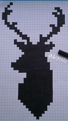 a pen is sitting on top of a piece of paper with an image of a deer