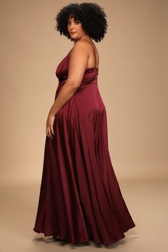 Radiate elegance with the Lulus Ode To Love Burgundy Satin Maxi Dress! Luxe satin shapes this gorgeous gown featuring a slip silhouette, adjustable spaghetti straps, and a plunging surplice bodice with princess-seams. The fitted empire waist rests atop a flowing maxi skirt with a faux wrap design. Hidden back zipper/clasp. Fit: This garment fits true to size. Length: Floor length. Size medium measures 57" from top to bottom. Bust: Great for any cup size. Waist: Fitted - very fitted at natural wa Satin Slip Dress With Ruched Bodice For Bridesmaids, Satin Dress With Spaghetti Straps And Sweep Train, Satin Dresses With Spaghetti Straps And Sweep Train, Satin Dresses With Sweep Train And Spaghetti Straps, Satin Evening Dress With Spaghetti Straps For Bridesmaid, Satin Finish Maxi Dress With Spaghetti Straps For Wedding, Wedding Maxi Dress With Satin Finish And Spaghetti Straps, Bridesmaid Evening Dress With Spaghetti Straps In Satin, Satin Gown With Ruched Bodice And Spaghetti Straps