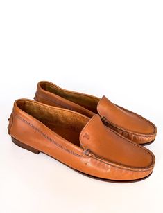 Classic Tod's moccasins slippers shoes in brown-caramel leather with blue stitching,  Tod's Gommino moccasins .  Good used condition, some small scuffs at the leather at the sides, no defects, see photos.  No box, no dust bag. Size - 36 EU. PLEASE NOTE Vintage item, some signs of wear are expected.  I always make a lot of high quality photos. Please carefully look and zoom pictures and read description till the end. All sales are final. Returns or exchange accepted folloving shop's policies. Any Brown Moccasins With Stitched Sole, Brown Almond Toe Moccasins With Rubber Sole, Brown Flat Heel Moccasins With Stitched Sole, Brown Slip-on Moccasins With Round Toe, Brown Leather Sole Slip-on Moccasins, Brown Slip-on Moccasins With Leather Sole, Brown Leather Sole Slip-on Loafers, Brown Slip-on Loafers With Leather Sole, Classic Brown Leather Slippers