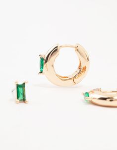 Step up your earring game with this dazzling trio of Gold Baguette cut Green Marquise Diamante Huggies. With their shiny, stacked style, these hoops add instant glam. Mix, match, or rock them all together for a look that'll definitely turn heads. Material: Crystal Dimensions: Length 16 mm x Width 4 mm | Lovisa Gold Baguette Green Marquise Huggie Earrings 3-Pack Huggie Earrings, Baguette Cut, Huggies Earrings, Mix Match, Step Up, Turn Ons, Green, Gold, Baguette