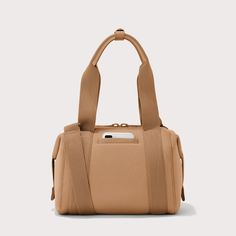 Our small Landon Carryall in Camel is the ultimate duffle bag for a full day ahead. Its petite size won't impede on a daily commute and when unsnapped at the sides, has enough space to hold a change of clothes for any post-work activity or to pick up a few things at the farmers market on weekends. The small Landon includes a stretch key leash and practical pockets for a tablet, charging cords, and water bottle. A detachable cross-body strap provides more ways to carry it all with ease. We use 10 Versatile Beige Duffle Bag For Daily Use, Versatile Large Capacity Beige Duffle Bag, Versatile Beige Large Capacity Duffle Bag, Versatile Everyday Satchel Duffle Bag, Functional Beige Satchel For On-the-go, Versatile Beige Everyday Duffle Bag, Functional Beige Gym Bag For Everyday Use, Beige Versatile Travel Bag, Functional Beige Everyday Travel Bag