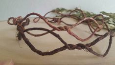 This simple wood vine headband is perfect for spring, or any time of year. No flowers or leaves added for this style.  Choose from 3 base colors for your wood vine tiara: - platinum blonde - sandy blonde - dark brown I make each vine headband to order in your size. This earthy vine tiara is made with a lightweight, flexible wrapped vine garden wire base. This style of headband crown is open in the back (it is not a continuous circle) but if you prefer a full circlet style, please message me before ordering. The ends of the headband are wrapped for comfort.   **SIZING GUIDE**  Most smalls and medium-size headbands will fit kids or adults. Each green vine headband can be gently bent and shaped to your head for the ideal fit. Age sizing estimates are outlined below, but you know your head bes Woodland Headband, Vine Crown, Fairy Flower Crown, Vine Garden, Fairy Headband, Nature Crown, Eve Costume, Woodland Crown, Flower Head Wreaths