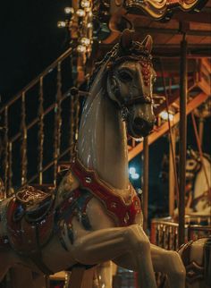 a merry go round horse is on display