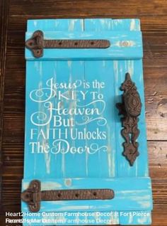 a wooden sign with the words jesus is the key to heaven but all unlocks the door