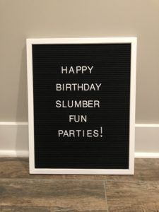 a sign that says happy birthday slumber fun parties on the side of a wall