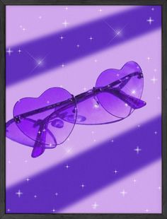 purple heart shaped sunglasses with stars in the background