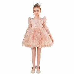 Indulge your little one in the ultimate luxury with the Dreamy Vow Pink Arabic Girl Dress. Designed with intricate sequins, this dress will make her feel like a true princess on her special day. Perfect for birthdays, weddings or any holiday, this gown will make her stand out in style. Embellished Princess Style Pageant Dress, Embellished Princess Dress For Dress-up, Princess Style Embellished Pageant Dress, Princess Style Long Sleeve Pageant Dress, Embellished Princess Dress For Pageant, Embellished Princess Dress For Pageants, Princess Style Long Sleeve Ball Gown For Pageant, Long Sleeve Sequin Princess Dress For Dress-up, Embellished Princess Dress For Party