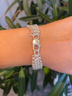 Stunning Heavy Quadruple Layered Rolo Chain Bracelet. It goes without saying that this is a standout bracelet. It may be simple, 4 layers of Rolo Chain Links, but it's sure to catch the eye of every passerby. Dimensions  - Chain: 4mm diameter   - Lobster Clasp: 19mm x 5mm *Over 25g of Sterling Silver (depending on size) *Comes elegantly wrapped *To add a charm or increase or reduce layers or to change the closure, please message me :) Thank you for stopping by my shop KyperCo on Etsy. Handmade Silver Multi-strand Wrap Bracelet, Silver Multi-strand Sterling Silver Bracelet, Silver Jubilee Bracelet Wrap As A Gift, Silver Jubilee Wrap Bracelet As Gift, Silver Jubilee Wrap Bracelet Gift, Silver Multi-strand Chain Bracelet, Silver Multi-strand Bracelet As Gift, Silver Multi-strand Chain Bracelet Gift, Silver Multi-strand Bracelet For Gift