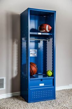 a blue locker with basketballs and balls in it