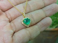 Heart-shaped Emerald Necklaces For Anniversary, Heart-shaped Emerald Necklace For Anniversary, Anniversary Heart-shaped Emerald Necklace, Emerald Jewelry For Valentine's Day Gift, Emerald Wedding Jewelry For Valentine's Day, Heart Cut Emerald Jewelry In Yellow Gold, Gold Emerald Heart Cut Jewelry, Emerald Jewelry For Anniversary On Valentine's Day, Elegant Heart-shaped Emerald Jewelry