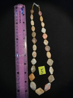 A beautiful string of Bended white agate natural found from Afghanistan dating 1800 yrs. They are found at that time in Afghanistan mostly but also some found in India and Pakistan too. They were used as a special charm jewellery by the affluents at that time period. Beautiful counter bronze are decorated further in between the beads. Antique Gemstone Beaded Necklace, Antique Gemstone Necklace With Round Beads, Vintage Agate Jewelry With Polished Beads, Antique Beaded Agate Jewelry, Vintage White Gemstone Beads Jewelry, Vintage Gemstone Beads Jewelry For Healing, Vintage Jewelry With Round Natural Stones, Vintage White Jewelry With Gemstone Beads, Vintage Agate Beads With Natural Stones