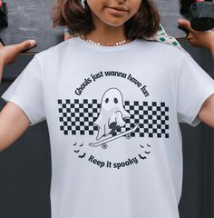 Get ready for spooky season with your Retro Halloween Shirt it will be the perfect for those vintage lover who want to make unique memories in this Halloween Holidays. *Quick Facts*  The unisex soft-style t-shirt puts a new spin on casual comfort. Made from very soft materials, this tee is 100% cotton for solid colors. Heather colors and sports grey include polyester. The shoulders have twill tape for improved durability. There are no side seams. The collar is made with ribbed knitting to preven White Grunge T-shirt For Halloween, White Grunge Tops For Halloween, Spooky Crew Neck Shirt With Screen Print, Spooky Screen Print Crew Neck Shirt, Spooky White Shirt With Letter Print, White Spooky Crew Neck Shirt, White Crew Neck Spooky Shirt, White Halloween Shirt With Custom Print, Grunge Halloween Streetwear Shirt