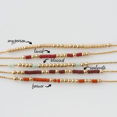 four beaded necklaces with different types of beads and gold chains, labeled in the following words