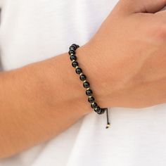 High quality man bracelet for everyday use. This minimalist design is hand-crafted with love and passion.   *Free Express International Shipping *Free returns within 14 days from the order date. NEXT BUSINESS DAY SHIPPING! PRODUCT DETAILS *The product is made of 100% 14k Solid Gold and it has a 14K or 585 stamp on item. (We don't sell filled or plated jewelry) *The package includes a gold certificate.  *Every package comes in a gift box. *14K gold indicates that the product is produced from 58% pure gold. *The product is yellow gold. *       Made in Türkiye. ORDER PROCESS *       There are two variations for this model. One of them is with big beads and the other is small one. Gold parts are same on both models. ABOUT SHIPPING We ship all packages safely with EXPRESS SHIPPING. Estimated sh Masculine Black Jewelry For Gift, Modern Black Hand-strung Beaded Bracelets, Masculine Black Bracelet Jewelry, Classic Adjustable Black Bead Bracelets, Classic Adjustable Black Bead Bracelet, Classic Adjustable Black Beads Bracelet, Classic Adjustable Black Beaded Bracelets, Modern Black Hand-strung Bracelets, Modern Black Hand-strung Bracelet