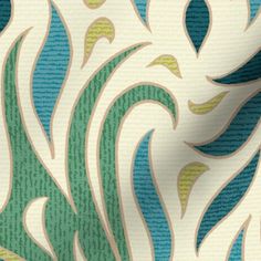 a close up view of a blue and green wallpaper