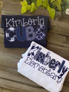 two t - shirts that say kimberly cup club and elementary school on them