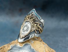 * * King Solomon ring , Pentagram ring , Mens ring , Seal of Solomon ring , Man ring silver , Engrave man ring , Solomon ring , Jewish ring , Man ring engrave , Religious gift for man , Jewish gift for man , Man sterling silver ring , Gift for him , Solomon seal ring , Star engrave ring , Sterling silver ring , Religious men ring , Man star of David ring * Product Weight: Approximately 22 grams ( May differ due to sizing and handmade structure) ( 1 ounce = 28.5 grams ) * Preparation Time usually Star Of David Engraved Ring As Gift, Star Of David Engraved Rings For Gifts, Engraved Star Of David Ring As Gift, Jewish Ring, Archery Thumb Ring, Pentagram Ring, Solomon Seal, Solomons Ring, David Ring