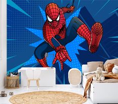 a room with a bed, rug and wall mural depicting a spider - man jumping