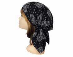 Elastic back for easy-on, easy-off style.  Perfect to wear for those with hair loss or as a fun fashion statement. Machine Wash Cold. Made in the USA. Polyester One size fits most One Size Bandana With Bandana Print For Beach, Adjustable Bandana Print Headwrap For Summer, Trendy Bandana Print Headband, Casual Festival Headwrap With Bandana Print, Trendy Festival Bandana Print Headscarf, Casual Bandana Print Headwrap For Festivals, Adjustable Black Headwrap For Beach, Adjustable Black Headwrap For The Beach, Black Bohemian Headwrap For The Beach