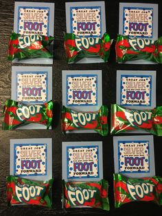 six candy bars with the words foot forward written on them are laid out in front of each other