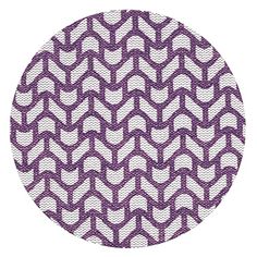 a circular purple and white pattern on fabric