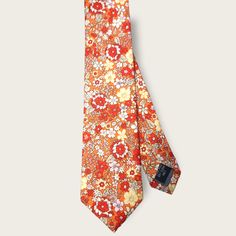 Treat yourself with a new pattern and splash of color to your look with this unique tie set. 100% Cotton Handmade Package Includes: Slim Tie Length: 57" Width: 2.6" Warm iron if needed Summer Formal Ties With Floral Print, Red Tie As A Summer Gift, Multicolor Standard Tie For Summer, Summer Floral Print Tie, Summer Neckwear As Gift, Summer Floral Print Standard Tie, Fitted Neckwear For Summer Gifts, Multicolor Summer Ties For Formal Occasions, Yellow Summer Ties