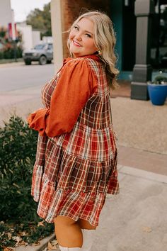 -This chic mini dress is full of fall energy! With its classic collared neckline, long sleeves, and a cozy plaid and corduroy combo, it's the perfect mix of comfort and style. Whether you're sipping pumpkin lattes or strolling through the park, this dress will have you feeling effortlessly cute and ready for all the autumn vibes! - Unlined rust colored corduroy and plaid material featuring ivory, red, rust, and different brown hues - A collared neckline - Long, loose sleeves with thin cuffs - A Chic Mini Dress, Plaid Mini Dress, Plaid Material, Loose Sleeves, Rust Dress, Leather Cowboy Boots, Autumn Vibes, Rust Color, Trending Now