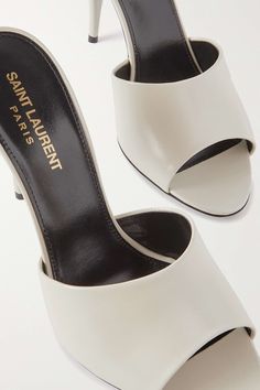 SAINT LAURENT Leather mules | NET-A-PORTER Christian Louboutin Mules, Ysl White Heels, Ysl Heels White, Ysl Heels Outfit, Football Girl, Designer Mules, White Mules, Cream Heels, Mule Heels