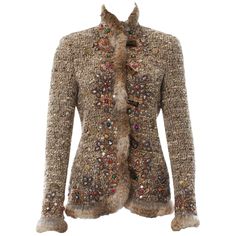 Rare, Museum Quality Oscar de la Renta Boucle Jacket Designer size 6 ( please check measurements) F/W 2004 Collection Rich Embellished and Embroidered, Rabbit Fur Trim, Decorative Horn Buttons. 85% Wool, 10% Mohair, 5% Polyamide Measurements: Length - 26 inches, Sleeve - 25 + fur, Bust - 34 inches. Made in Italy. Excellent Condition. Last picture show Oscar de la Renta wife wearing the same jacket. Same jacket with matching skirt available also in size 6. " Luxury to me is not about buying expen Last Picture Show, Laura Bush, Nancy Reagan, Elsa Schiaparelli, Vintage Clothes Women, Boucle Jacket, Evening Jackets, Embroidered Jacket, Pierre Cardin