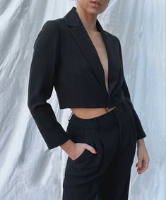 This crop jacket is the perfect way to mix-up a classic suit! With the cropped element, you have elevated the average suit into a trendy statement piece. #fashion #professional #trendyworkclothes #workergirly #cleangirlaesthetic #aesthetic Fitted Cropped Jacket With Double Button Closure, Fitted Blazer With Lapel Collar In Solid Color, Fitted Blazer With Lapel Collar, Fitted Plain Blazer With Lapel Collar, Office Cropped Jacket, Single Breasted, Collared, Elegant Collared Cropped Jacket For Office, Semi-formal Cropped Spring Blazer, Semi-formal Cropped Blazer For Spring, Elegant Fitted Cropped Button-up Jacket