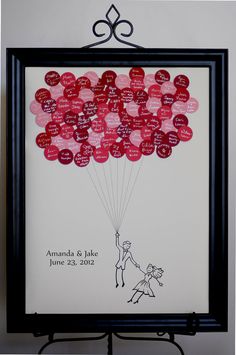 a photo frame with a drawing of a man and woman holding balloons in the shape of hearts