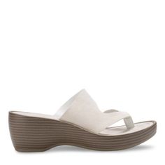 A just-right wedge and seamless straps add casual elegance to our Laurel sandal. Full-grain leather straps. Eastland Exclusive Active Memory Foam comfort insole supports and conforms to the curves of your foot. Shock absorbing Polyurethane outsole offe | Women's Eastland Laurel Thong Sandal, White, 9M Modern Wedge Sandals With Arch Support For Beach, Comfortable Beige Wedge Sandals With Arch Support, Wedge Sandals With Toe Post And Arch Support, Synthetic Toe Post Wedge Sandals With Arch Support, Adjustable Toe Post Wedge Sandals With Arch Support, Synthetic Wedge Sandals With Cushioned Footbed, Synthetic Toe Loop Wedge Sandals With Cushioned Footbed, Beige Synthetic Wedge Sandals With Arch Support, Wedge Sandals With Arch Support And Single Toe Strap