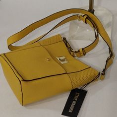 Madden Described This Bag As A Mustard Colored, Vegan Leather, Bucket Style Crossbody Bag. Features Inside And Outside Pockets, Adjustable Strap And Gold Hardware. Nwt. Bag Measures 9" X 9" With A 5" Base. Straps Have A 25+" Drop. Trendy Yellow Shoulder Bag With Cell Phone Pocket, Yellow Shoulder Bag With Cell Phone Pocket, Chic Yellow Satchel With Mobile Phone Bag, Chic Yellow Satchel With Phone Bag, Yellow Satchel Shoulder Bag With Cell Phone Pocket, Yellow Crossbody Bag With Cell Phone Pocket, Yellow Tote Satchel With Mobile Phone Bag, Yellow Crossbody Satchel For Spring, Spring Yellow Satchel With Adjustable Strap