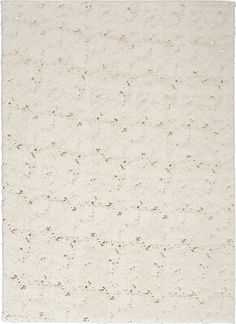 a white rug with small brown dots on the top and bottom, against a white background