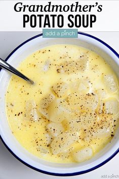 a bowl of potato soup with a spoon in it