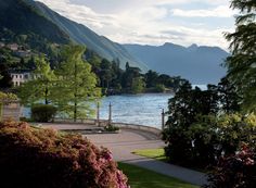 a scenic view of the water and mountains